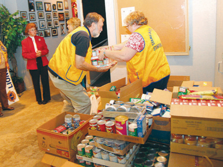 lions feeding the hungry image